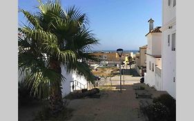 Vivienda adosada a 150m de la playa + patio + wifi